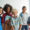 Group of middle school students standing together smiling