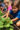 Young children gardening smiling